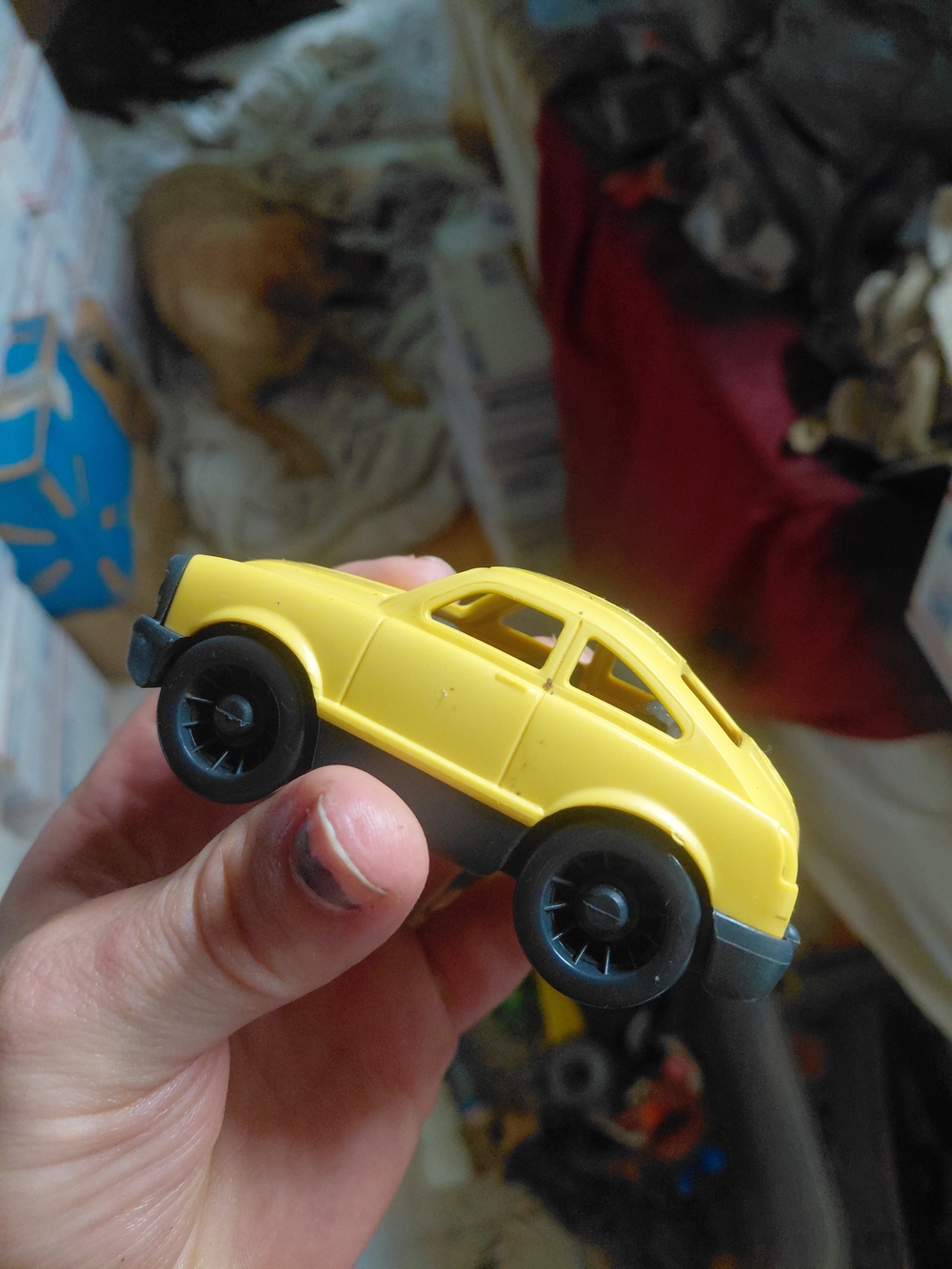 yellow Green Toys Mini Car, an eco-friendly miniature vehicle